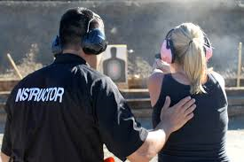 Man and woman at shooting range